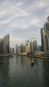 Explore the stunning skyline and serene waters of Dubai Marina in this captivating view.
